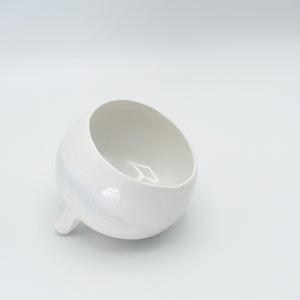 White tilted bowl