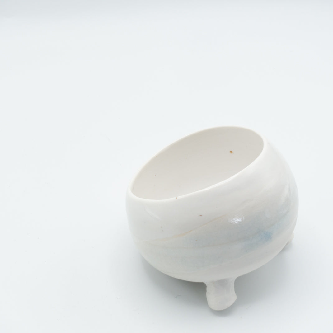 White tilted bowl